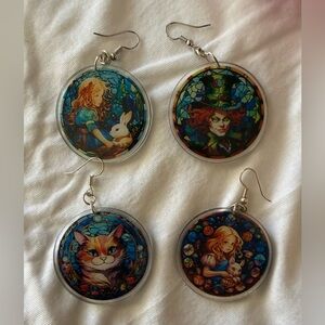 NWOT Alice in Wonderland themed Earrings 4 piece set of 2